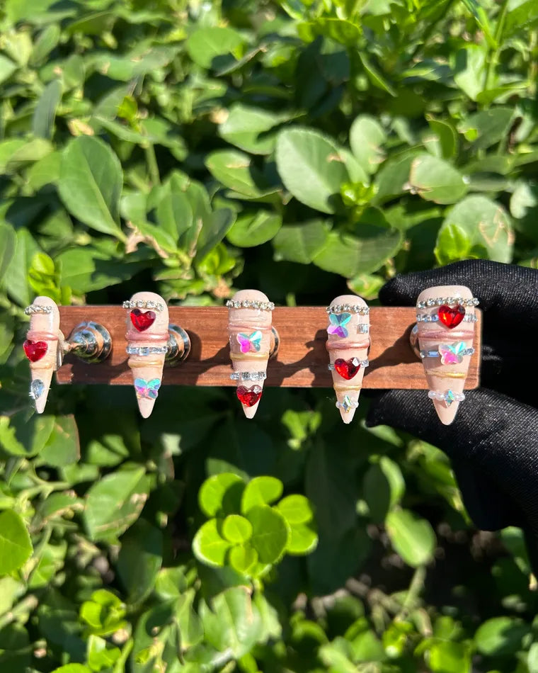 2 red heart gem nails